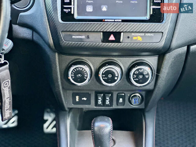 Серый Мицубиси Outlander Sport, объемом двигателя 2 л и пробегом 71 тыс. км за 13900 $, фото 31 на Automoto.ua