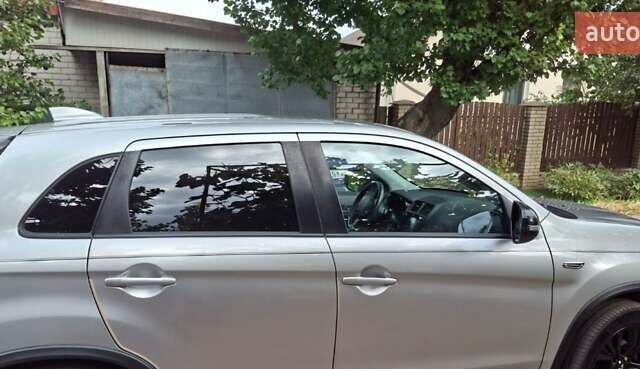 Серый Мицубиси Outlander Sport, объемом двигателя 2 л и пробегом 69 тыс. км за 15000 $, фото 11 на Automoto.ua