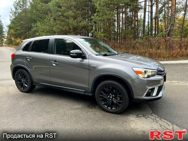 Серый Мицубиси Outlander Sport, объемом двигателя 2 л и пробегом 45 тыс. км за 17300 $, фото 3 на Automoto.ua