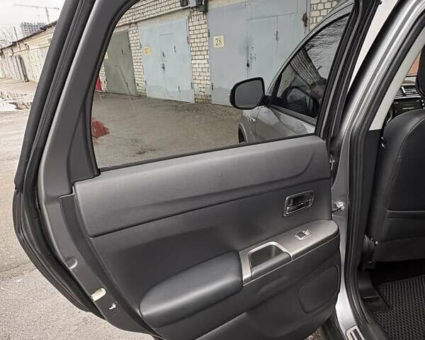 Серый Мицубиси Outlander Sport, объемом двигателя 2.4 л и пробегом 86 тыс. км за 15800 $, фото 10 на Automoto.ua