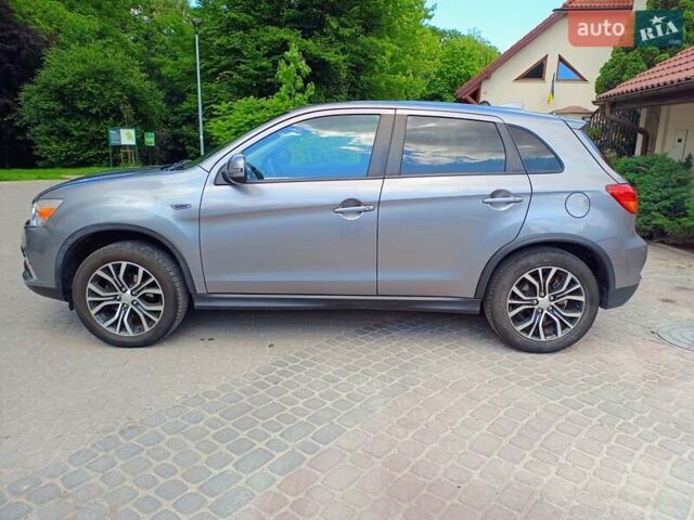 Серый Мицубиси Outlander Sport, объемом двигателя 2 л и пробегом 107 тыс. км за 12200 $, фото 7 на Automoto.ua