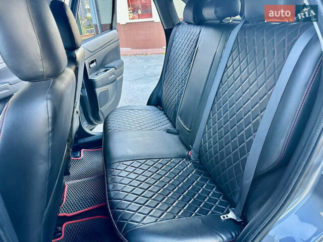 Серый Мицубиси Outlander Sport, объемом двигателя 2 л и пробегом 71 тыс. км за 13900 $, фото 29 на Automoto.ua