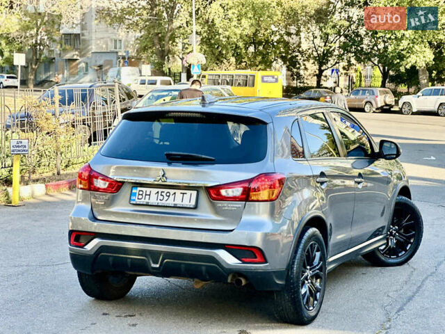 Серый Мицубиси Outlander Sport, объемом двигателя 2 л и пробегом 71 тыс. км за 13900 $, фото 11 на Automoto.ua