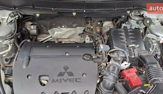 Серый Мицубиси Outlander Sport, объемом двигателя 2 л и пробегом 69 тыс. км за 15000 $, фото 5 на Automoto.ua