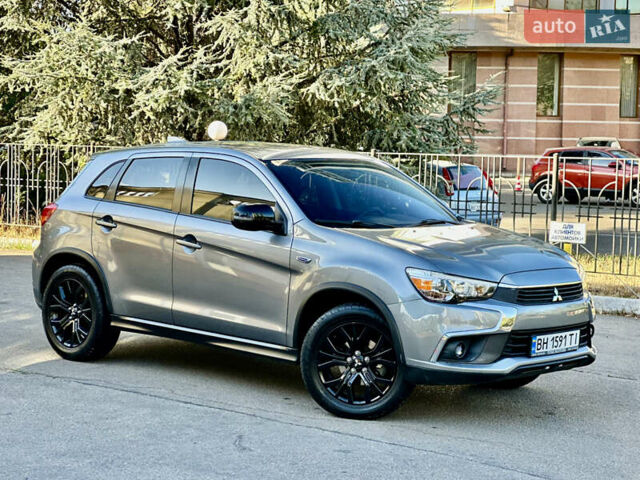Серый Мицубиси Outlander Sport, объемом двигателя 2 л и пробегом 71 тыс. км за 13900 $, фото 14 на Automoto.ua