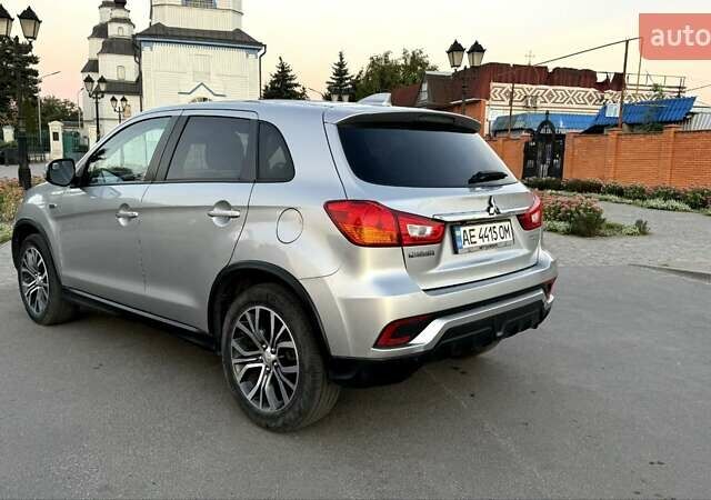Серый Мицубиси Outlander Sport, объемом двигателя 2 л и пробегом 80 тыс. км за 13599 $, фото 1 на Automoto.ua