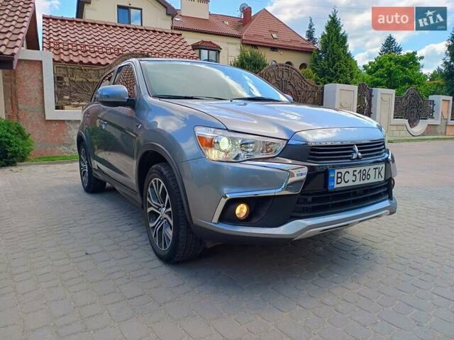 Серый Мицубиси Outlander Sport, объемом двигателя 2 л и пробегом 107 тыс. км за 12200 $, фото 2 на Automoto.ua