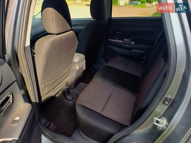 Серый Мицубиси Outlander Sport, объемом двигателя 2 л и пробегом 107 тыс. км за 12200 $, фото 12 на Automoto.ua