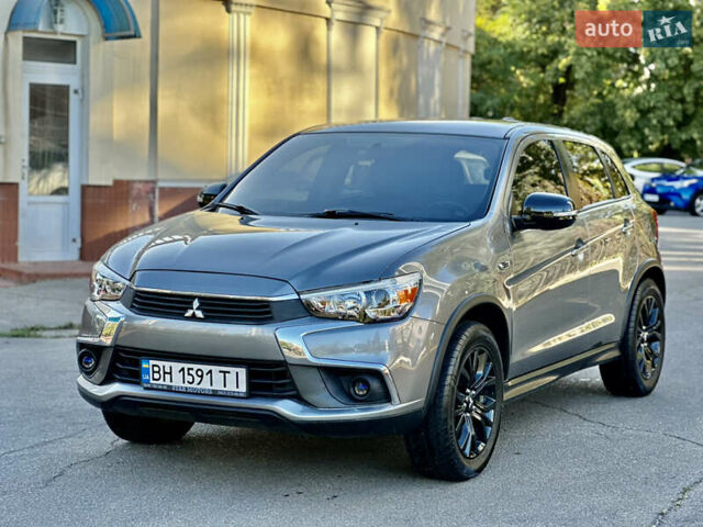 Серый Мицубиси Outlander Sport, объемом двигателя 2 л и пробегом 71 тыс. км за 13900 $, фото 2 на Automoto.ua