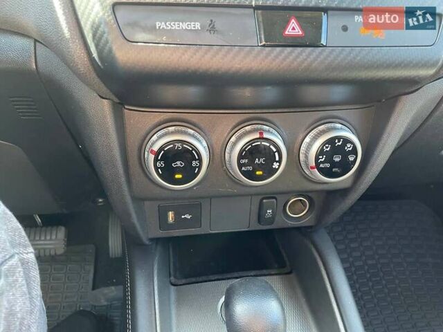 Серый Мицубиси Outlander Sport, объемом двигателя 2 л и пробегом 88 тыс. км за 15999 $, фото 14 на Automoto.ua