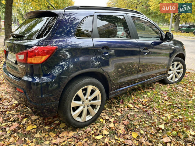 Синий Мицубиси Outlander Sport, объемом двигателя 2 л и пробегом 234 тыс. км за 9900 $, фото 8 на Automoto.ua
