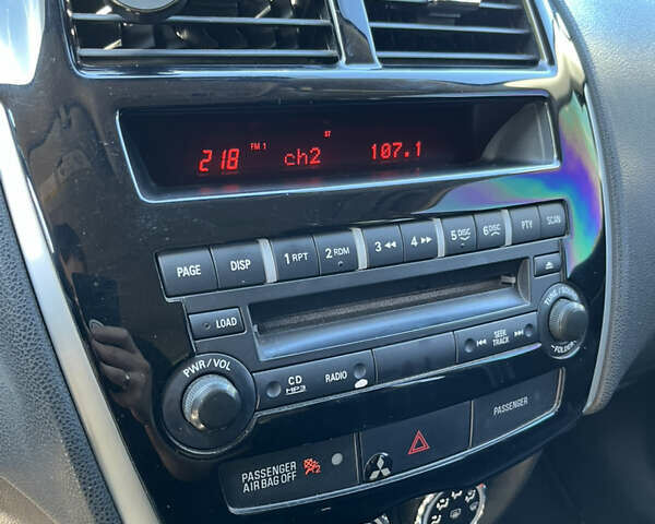 Синий Мицубиси Outlander Sport, объемом двигателя 2 л и пробегом 234 тыс. км за 9900 $, фото 21 на Automoto.ua