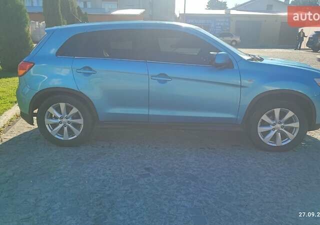 Синий Мицубиси Outlander Sport, объемом двигателя 2 л и пробегом 156 тыс. км за 9000 $, фото 6 на Automoto.ua