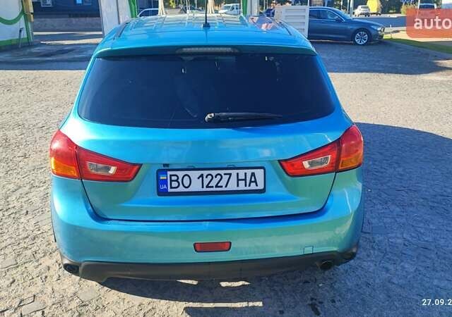 Синий Мицубиси Outlander Sport, объемом двигателя 2 л и пробегом 156 тыс. км за 9000 $, фото 4 на Automoto.ua