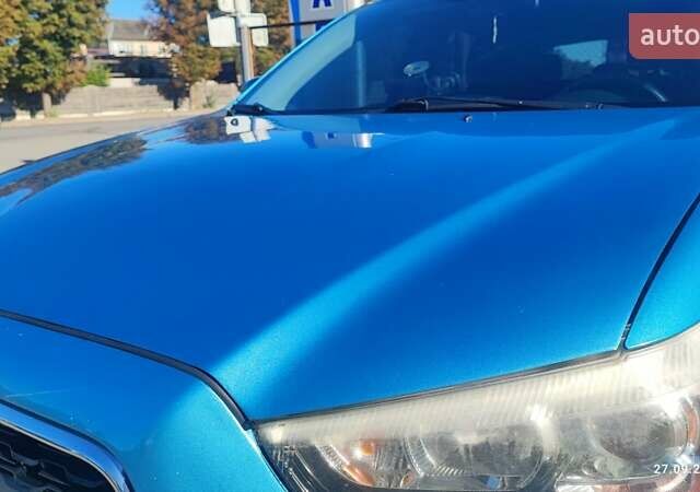 Синий Мицубиси Outlander Sport, объемом двигателя 2 л и пробегом 156 тыс. км за 9000 $, фото 15 на Automoto.ua