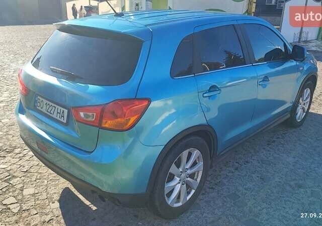 Синий Мицубиси Outlander Sport, объемом двигателя 2 л и пробегом 156 тыс. км за 9000 $, фото 5 на Automoto.ua