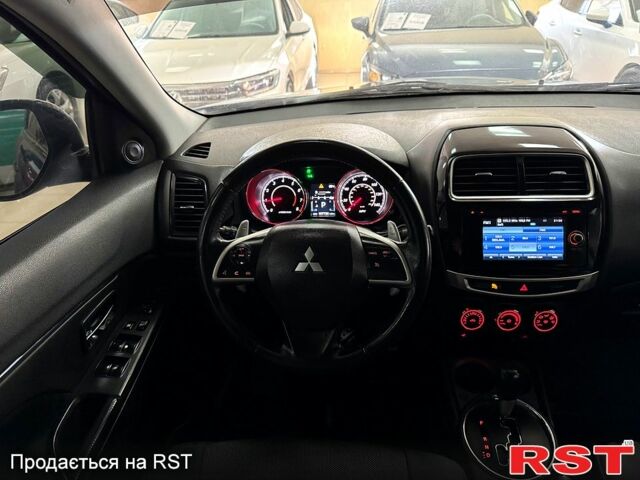 Синий Мицубиси Outlander Sport, объемом двигателя 2.4 л и пробегом 107 тыс. км за 12600 $, фото 8 на Automoto.ua
