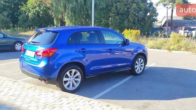 Синий Мицубиси Outlander Sport, объемом двигателя 2 л и пробегом 130 тыс. км за 11600 $, фото 7 на Automoto.ua