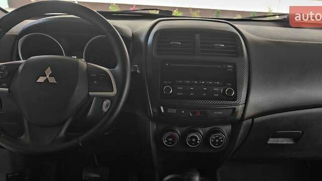 Синий Мицубиси Outlander Sport, объемом двигателя 2 л и пробегом 130 тыс. км за 11600 $, фото 14 на Automoto.ua