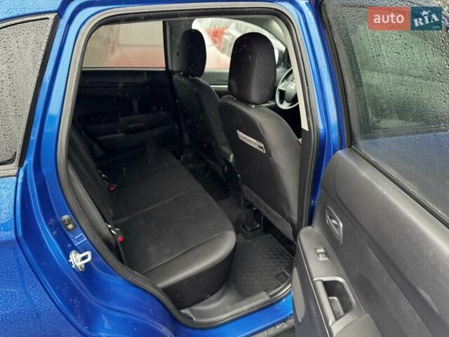 Синий Мицубиси Outlander Sport, объемом двигателя 2 л и пробегом 177 тыс. км за 12000 $, фото 11 на Automoto.ua