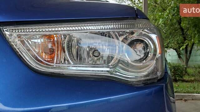 Синий Мицубиси Outlander Sport, объемом двигателя 2 л и пробегом 130 тыс. км за 11600 $, фото 9 на Automoto.ua