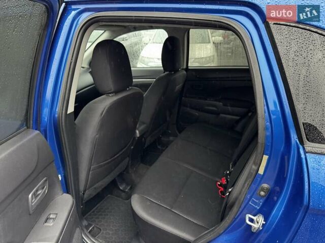 Синий Мицубиси Outlander Sport, объемом двигателя 2 л и пробегом 177 тыс. км за 12000 $, фото 10 на Automoto.ua