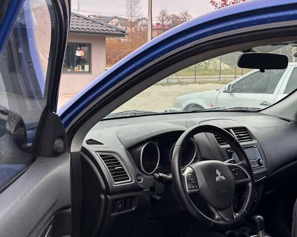 Синий Мицубиси Outlander Sport, объемом двигателя 2 л и пробегом 203 тыс. км за 8499 $, фото 8 на Automoto.ua