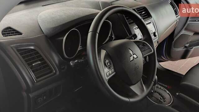 Синий Мицубиси Outlander Sport, объемом двигателя 2 л и пробегом 130 тыс. км за 11600 $, фото 16 на Automoto.ua