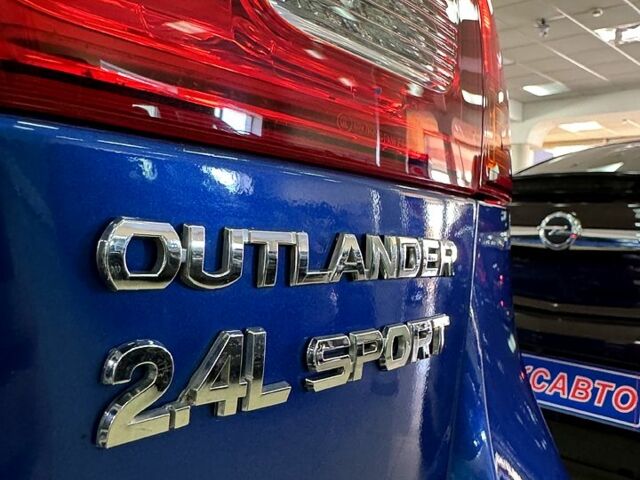 Синий Мицубиси Outlander Sport, объемом двигателя 2.4 л и пробегом 107 тыс. км за 12600 $, фото 9 на Automoto.ua
