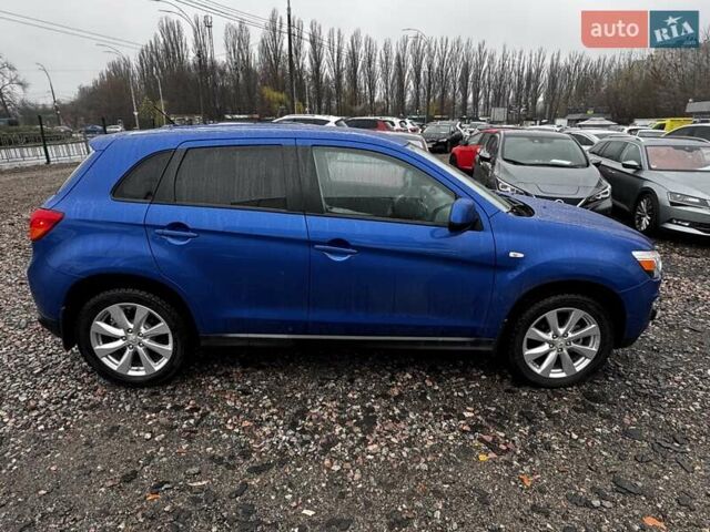 Синий Мицубиси Outlander Sport, объемом двигателя 2 л и пробегом 177 тыс. км за 12000 $, фото 7 на Automoto.ua