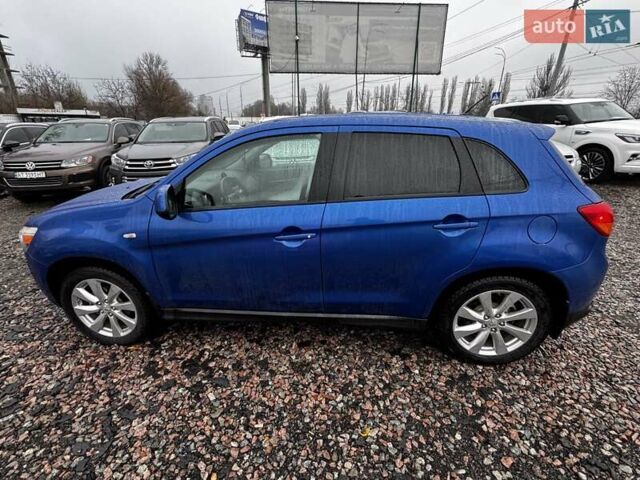 Синий Мицубиси Outlander Sport, объемом двигателя 2 л и пробегом 177 тыс. км за 12000 $, фото 6 на Automoto.ua
