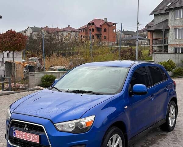 Синий Мицубиси Outlander Sport, объемом двигателя 2 л и пробегом 203 тыс. км за 8499 $, фото 1 на Automoto.ua