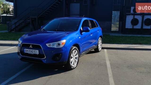 Синий Мицубиси Outlander Sport, объемом двигателя 2 л и пробегом 130 тыс. км за 11600 $, фото 2 на Automoto.ua