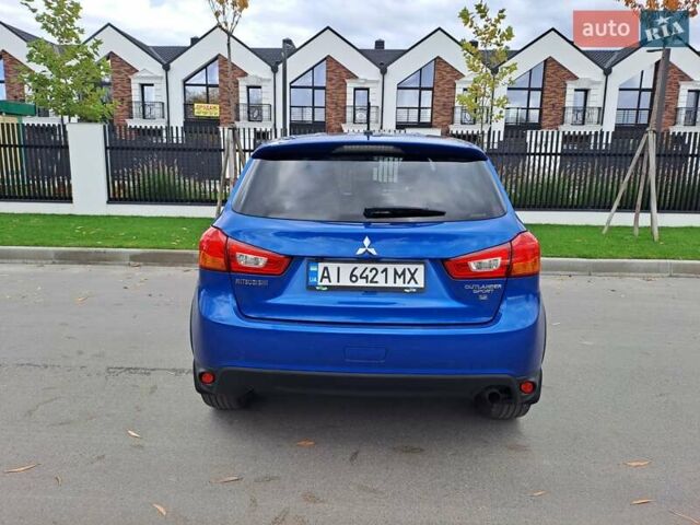 Синий Мицубиси Outlander Sport, объемом двигателя 2.36 л и пробегом 188 тыс. км за 11800 $, фото 4 на Automoto.ua