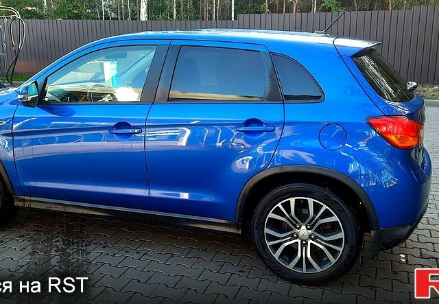 Синій Міцубісі Outlander Sport, об'ємом двигуна 2.4 л та пробігом 188 тис. км за 11400 $, фото 2 на Automoto.ua