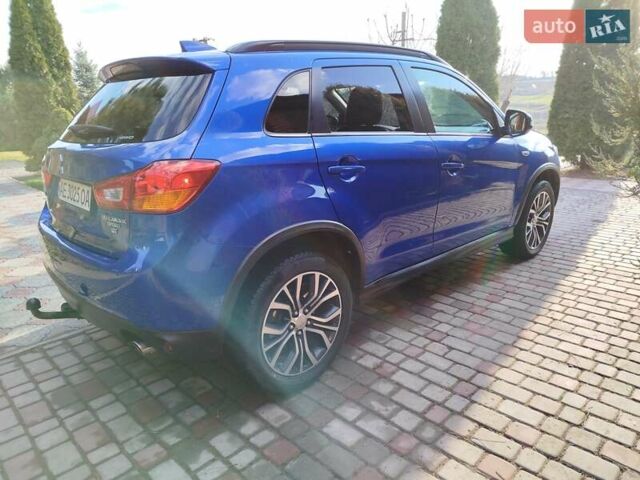 Синий Мицубиси Outlander Sport, объемом двигателя 2.4 л и пробегом 117 тыс. км за 13599 $, фото 5 на Automoto.ua