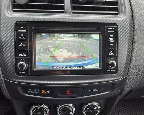 Синий Мицубиси Outlander Sport, объемом двигателя 2.36 л и пробегом 188 тыс. км за 11800 $, фото 22 на Automoto.ua