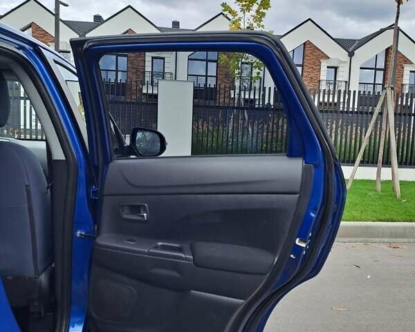 Синий Мицубиси Outlander Sport, объемом двигателя 2.36 л и пробегом 188 тыс. км за 11800 $, фото 15 на Automoto.ua