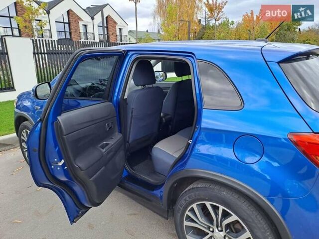 Синий Мицубиси Outlander Sport, объемом двигателя 2.36 л и пробегом 188 тыс. км за 11800 $, фото 14 на Automoto.ua