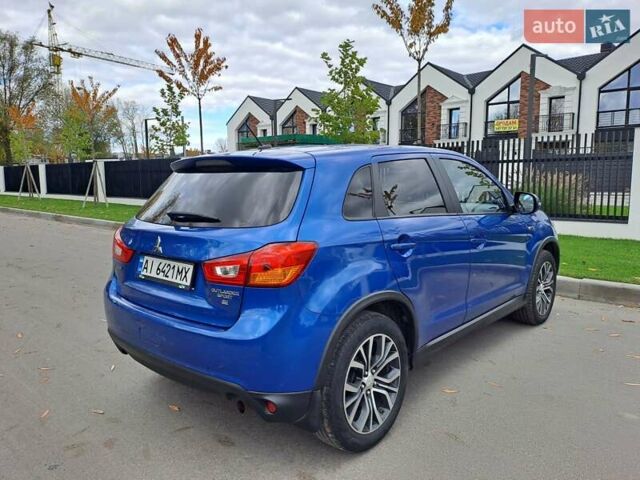 Синий Мицубиси Outlander Sport, объемом двигателя 2.36 л и пробегом 188 тыс. км за 11800 $, фото 6 на Automoto.ua