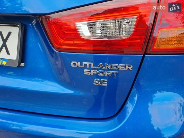 Синий Мицубиси Outlander Sport, объемом двигателя 2.36 л и пробегом 188 тыс. км за 11800 $, фото 27 на Automoto.ua