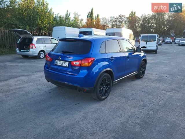 Синий Мицубиси Outlander Sport, объемом двигателя 2 л и пробегом 136 тыс. км за 13800 $, фото 8 на Automoto.ua