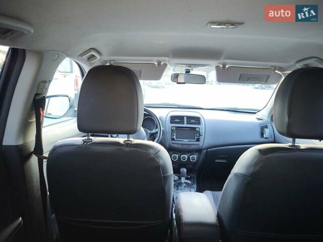 Синий Мицубиси Outlander Sport, объемом двигателя 2 л и пробегом 136 тыс. км за 13800 $, фото 7 на Automoto.ua