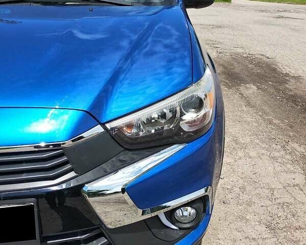 Синий Мицубиси Outlander Sport, объемом двигателя 2 л и пробегом 136 тыс. км за 13800 $, фото 5 на Automoto.ua