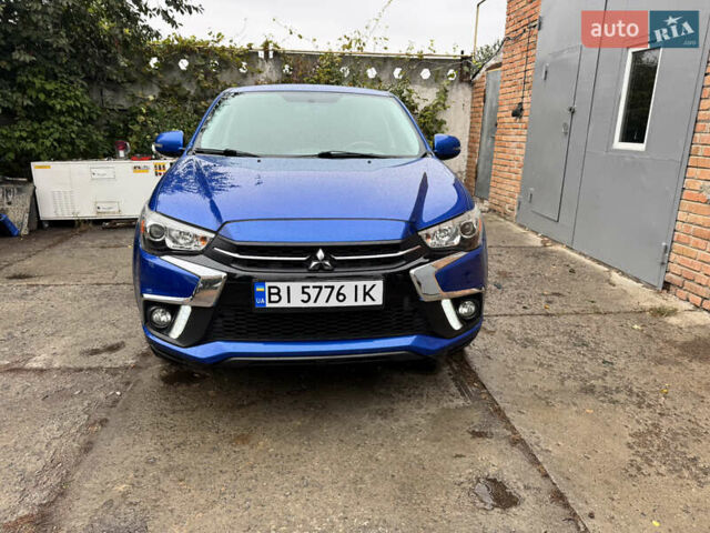 Синий Мицубиси Outlander Sport, объемом двигателя 2.36 л и пробегом 155 тыс. км за 13700 $, фото 2 на Automoto.ua