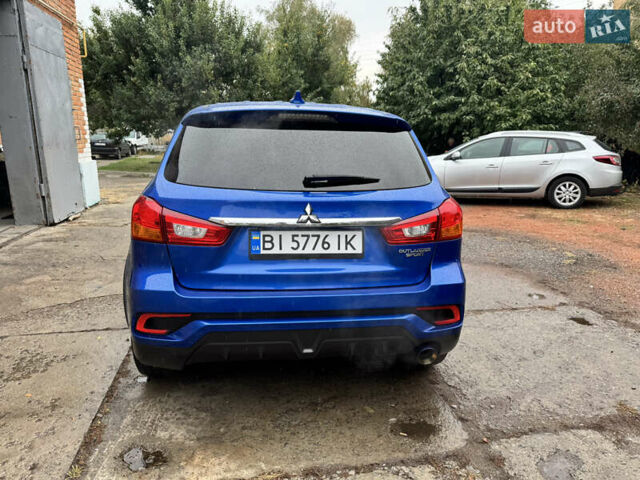 Синий Мицубиси Outlander Sport, объемом двигателя 2.36 л и пробегом 155 тыс. км за 13700 $, фото 3 на Automoto.ua