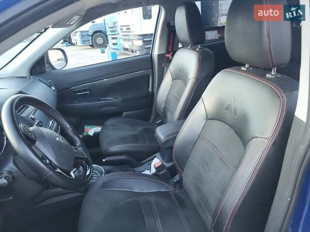 Синий Мицубиси Outlander Sport, объемом двигателя 2 л и пробегом 136 тыс. км за 13800 $, фото 12 на Automoto.ua
