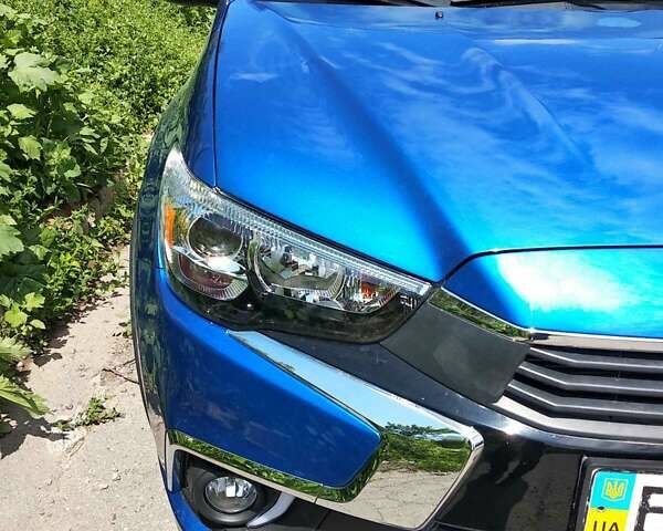 Синий Мицубиси Outlander Sport, объемом двигателя 2 л и пробегом 136 тыс. км за 13800 $, фото 19 на Automoto.ua