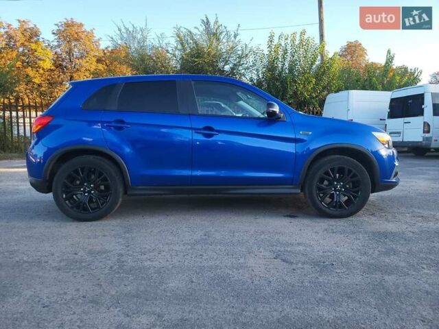 Синий Мицубиси Outlander Sport, объемом двигателя 2 л и пробегом 136 тыс. км за 13800 $, фото 3 на Automoto.ua