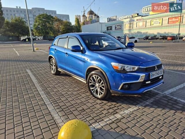 Синий Мицубиси Outlander Sport, объемом двигателя 2 л и пробегом 42 тыс. км за 15500 $, фото 13 на Automoto.ua